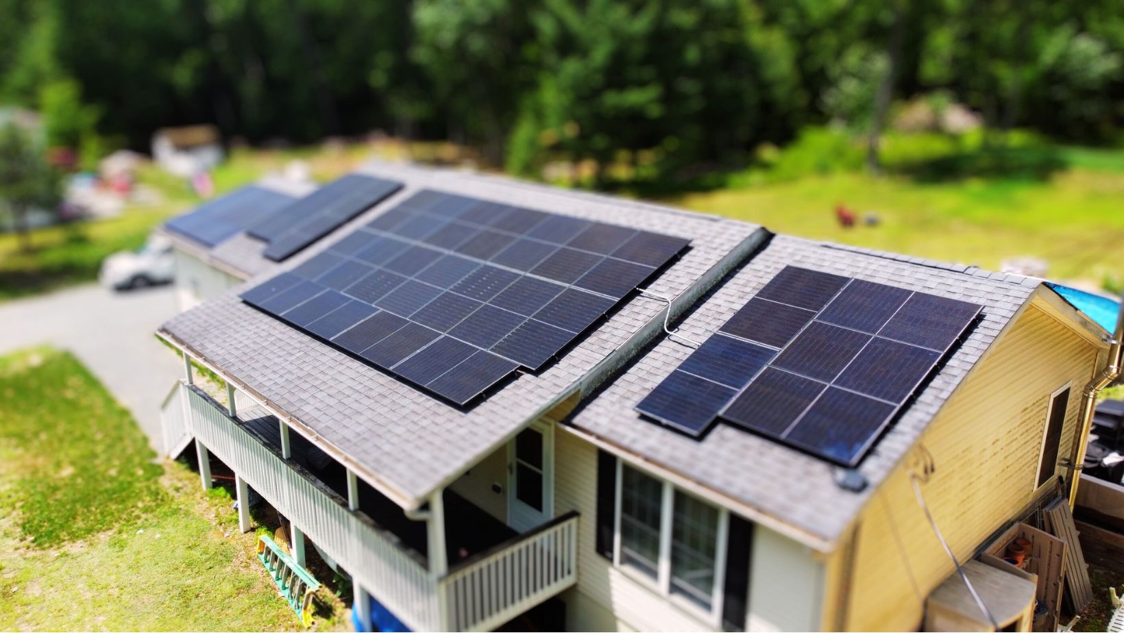 Aerial view of an all-black residential solar array installed by Solar Bear Energy
