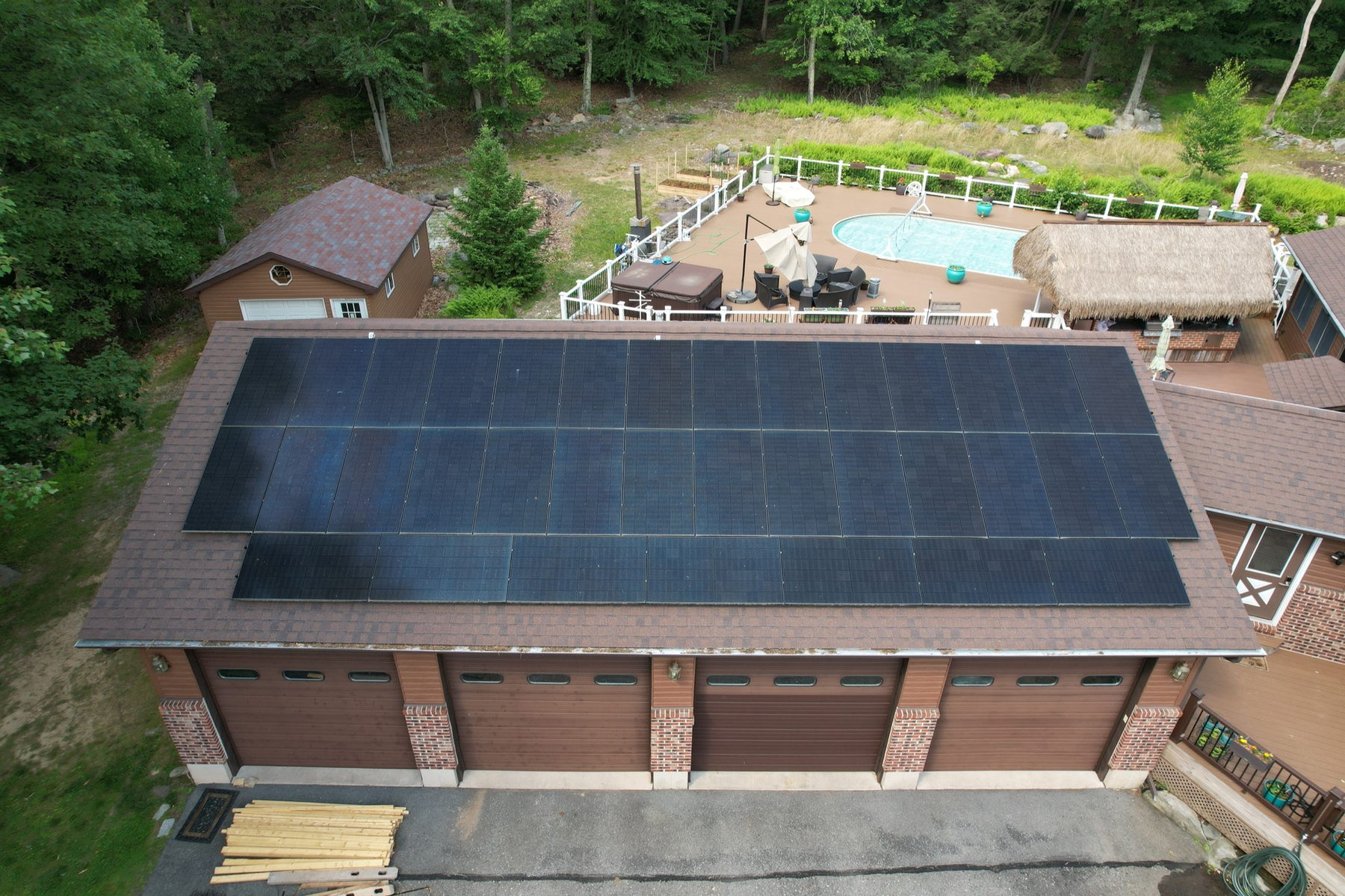 A home with a large rooftop solar array installed by Solar Bear Energy